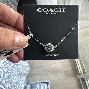 NWT & Gift Bag COACH Silver-Tone Slider Bracelet with Blue Crystal Accent